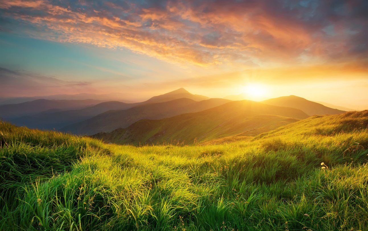 Mountain valley during sunrise. Natural summer landscape.